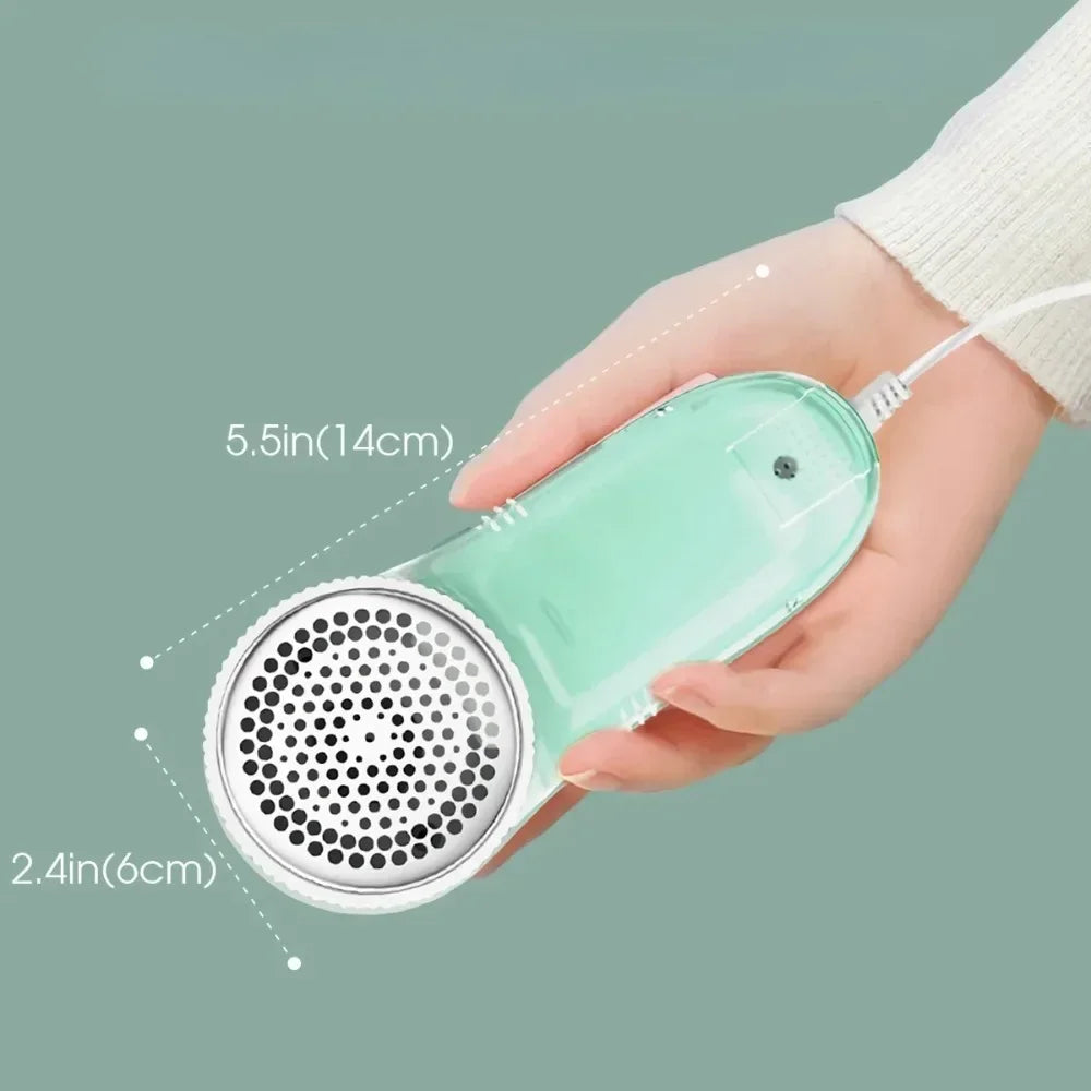 Electric lint remover effortlessly removes pet hair from clothes and fabrics.