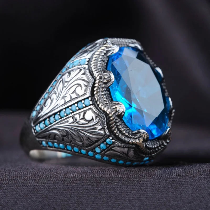 Retro handmade Turkish men's ring with blue zircon, vintage silver punk style.