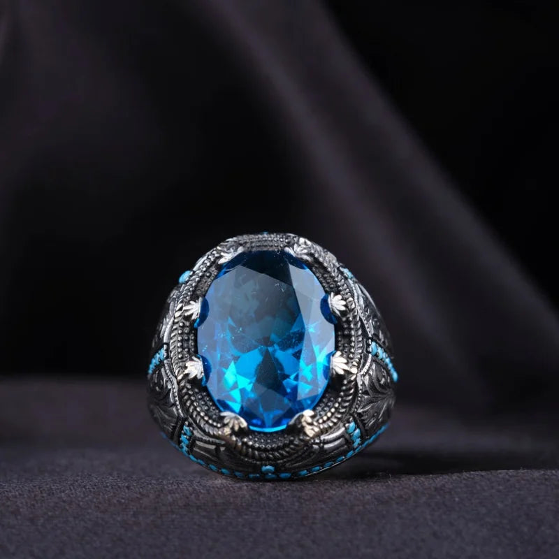 Retro handmade Turkish men's ring with blue zircon, vintage silver punk style.