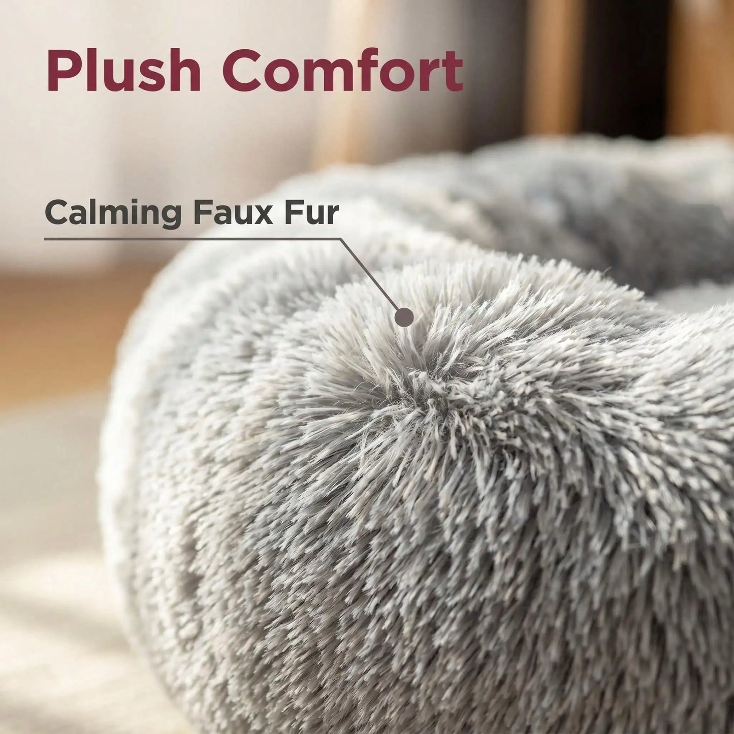 Soft calming donut bed reduces anxiety and provides cozy comfort.