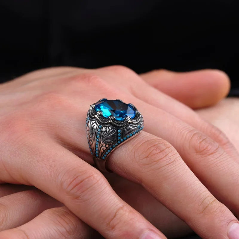 Retro handmade Turkish men's ring with blue zircon, vintage silver punk style.